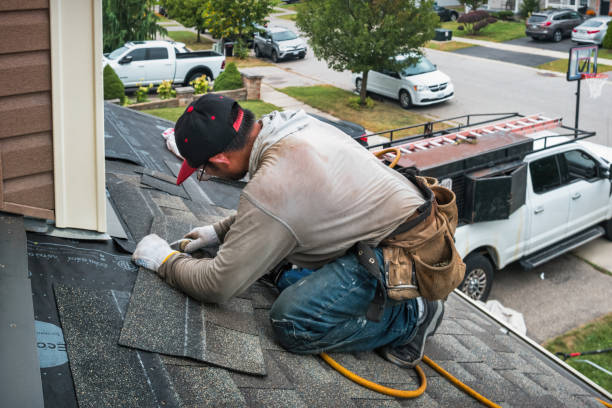 Professional Roofing technician working in Houghton Lake, MI